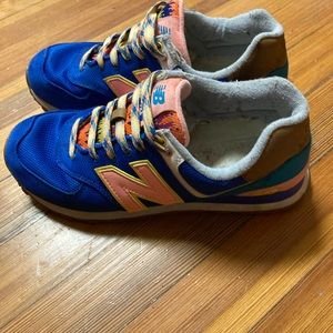New Balance Blue, Pink, Green, and Yellow tennis shoe. Lightly Worn Size 9 in W